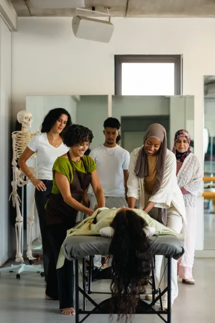 Brooke Wescott teaching massage technique