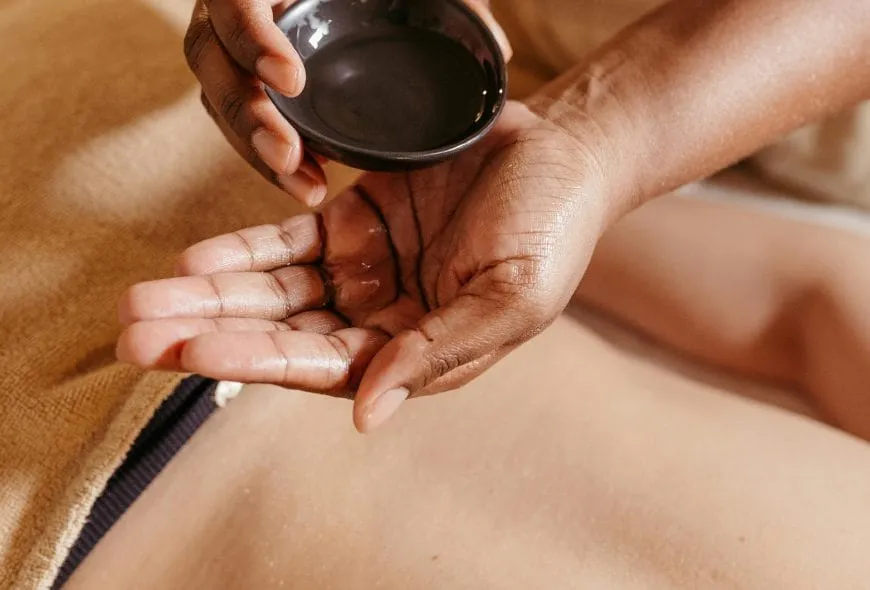 Hands preparing for a professional massage treatment